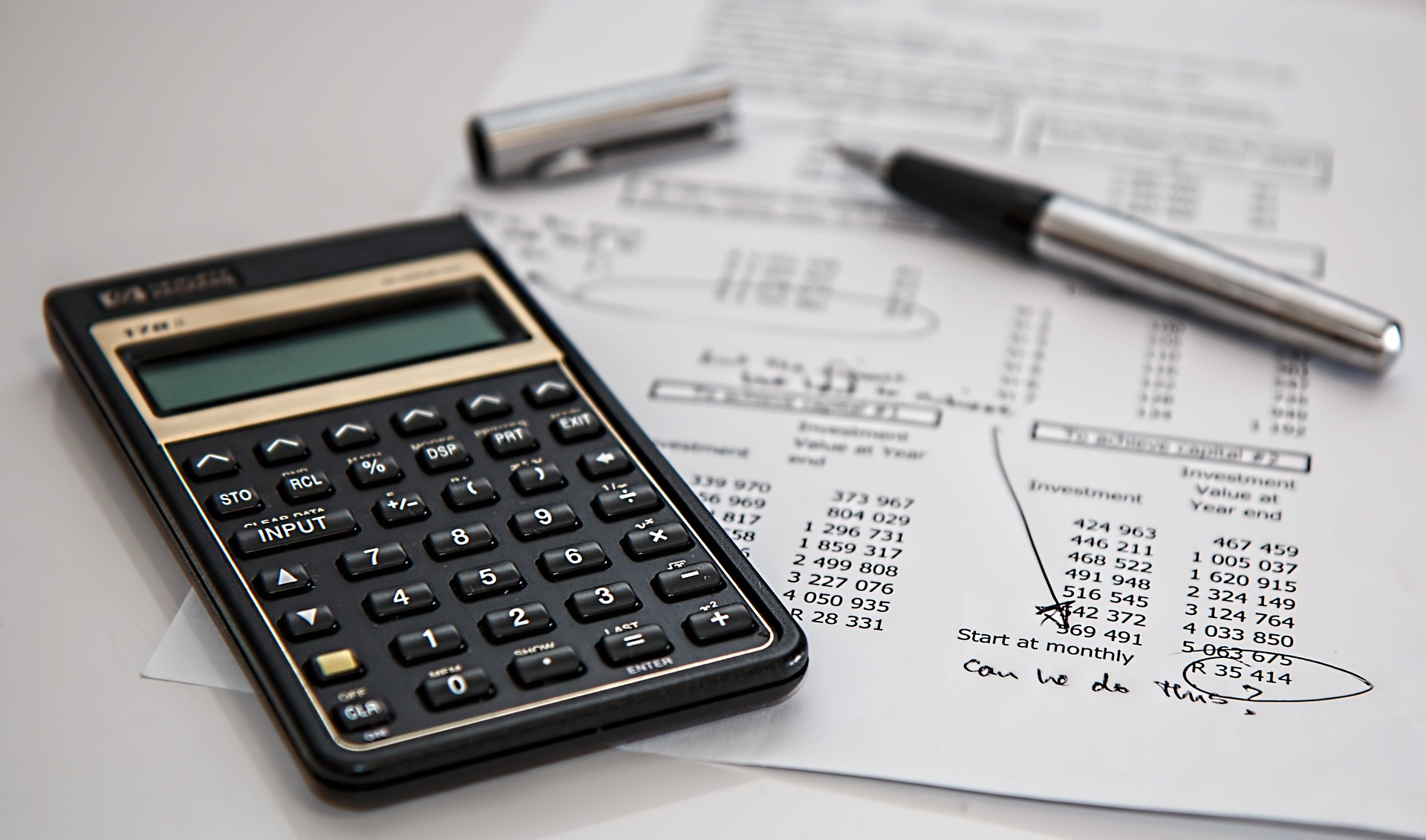 Accounting documents and calculator on a desk